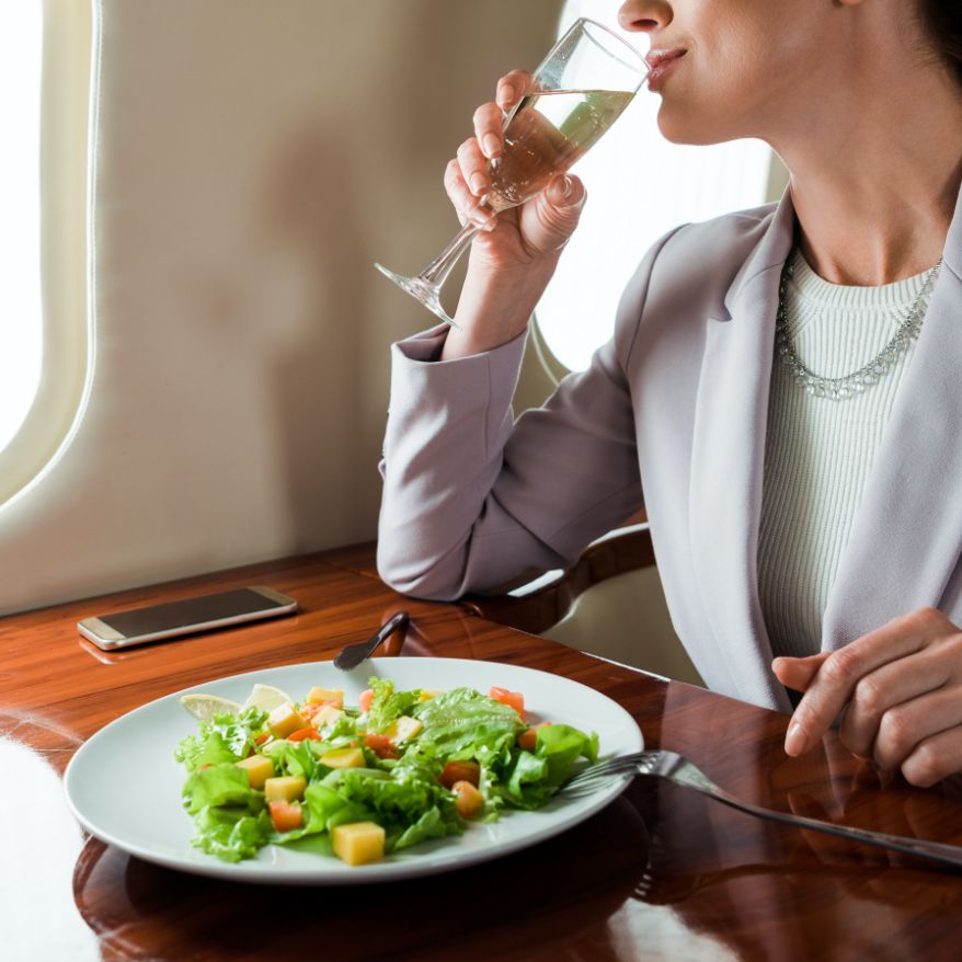 woman eating in her flight